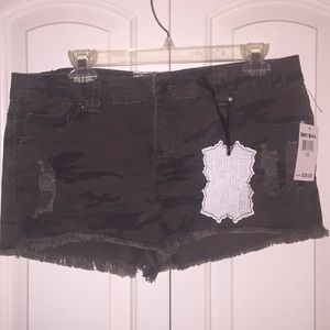 Camo distressed fringe shorts